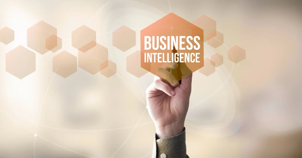 Mão destacando o conceito de Business Intelligence (BI) no varejo, representando o uso de dados para otimizar lojas autônomas.